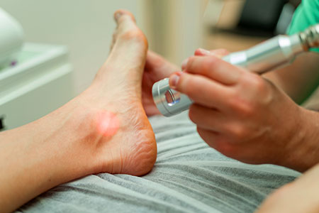 patient receiving class iv laser treatment in Orange