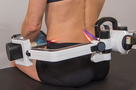 patient receiving cold laser treatment in Orange